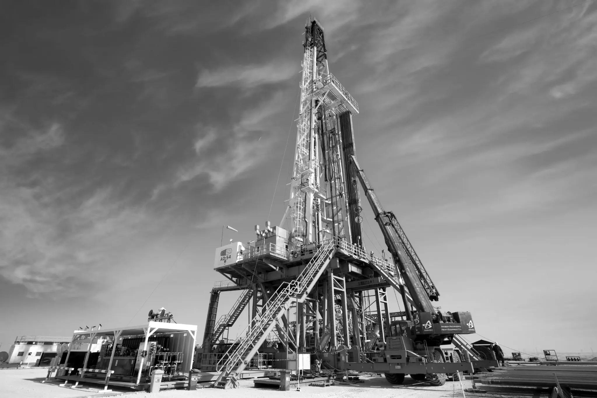 Onshore drilling rig extending behind the Zima contact experience
